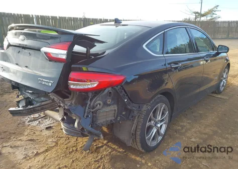 2019 Ford Fusion Hybrid Titanium from USA, damaged, VIN 3FA6P0RU9KR131576